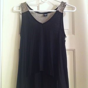 Never worn black top with silver sequin on back!