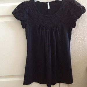 Black flowy top with lace over top and sleeves