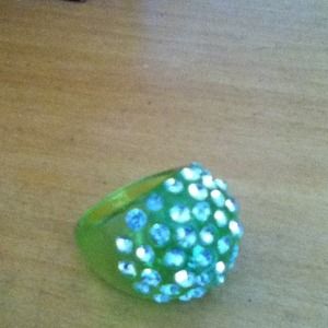 A green ring with diamonds