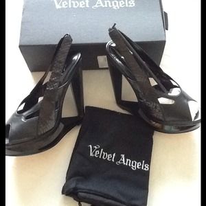 Very unique & trendy  black leather heels