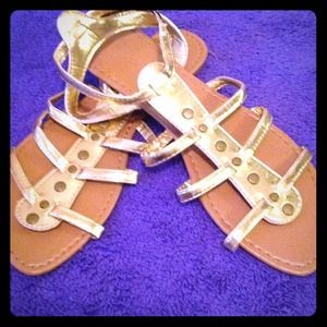 Gold sandals and snake skin sandals