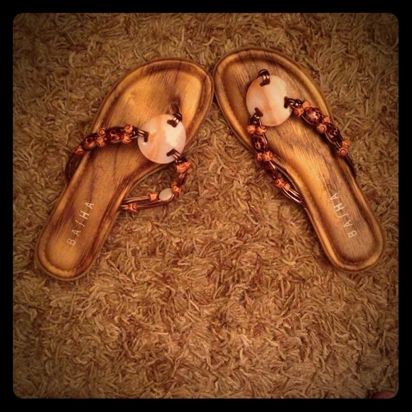 Flat beachy sandals.