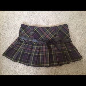 Purple plaid skirt.