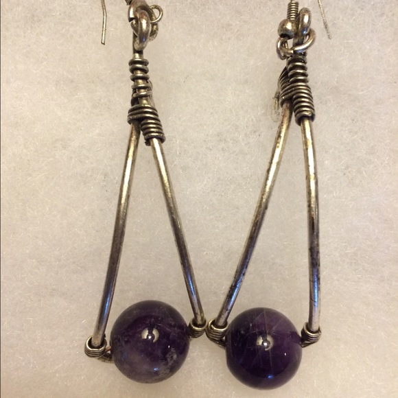 Purple orbs suspended from silver tubes earrings. - Picture 2 of 4