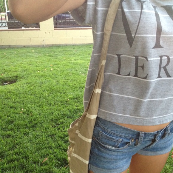 Tan and white striped hobo bag