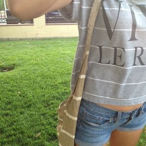 Tan and white striped hobo bag