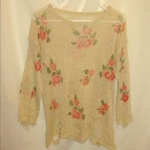 A "Destroyed" Beige Rose Sweater