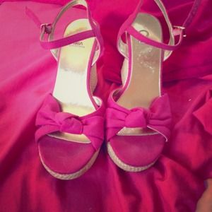Pink wedges, bow in front, canvas sides. RESERVED