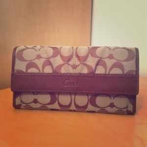 A large original logo/color Coach wallet.