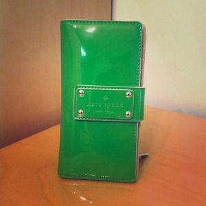 A beautiful green large Kate Spade wallet.