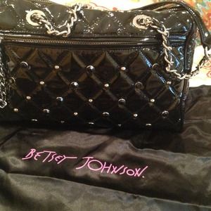 Black handbag by Betsy Johnson