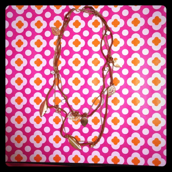 Gold feather necklace with rhinestones