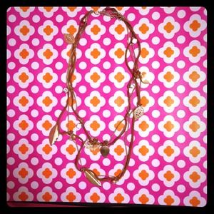 Gold feather necklace with rhinestones