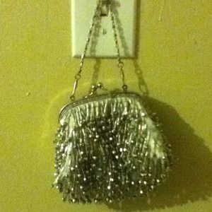 💙💜Sparkly  small and has a little pocket 💚
