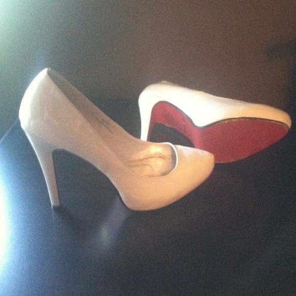 White high heels with red bottoms