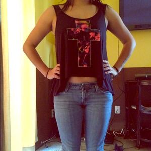 Tank top with a cross.