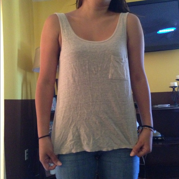 Tank top. Button up from the back