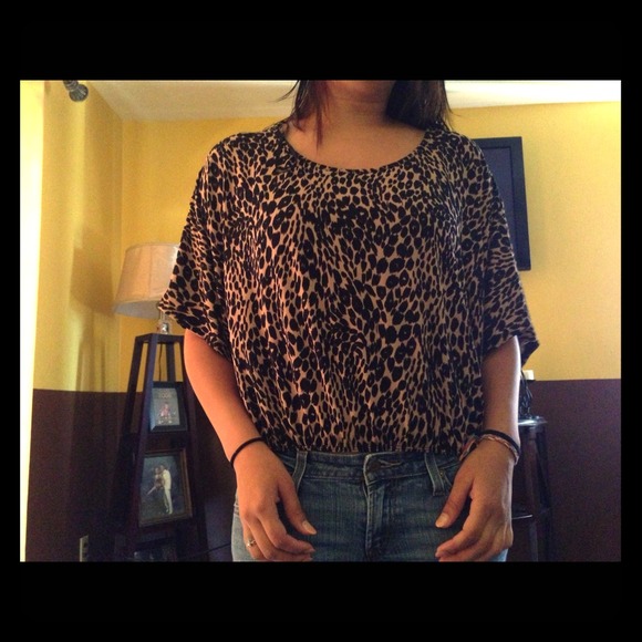 Cheetah print top with laced in the back.