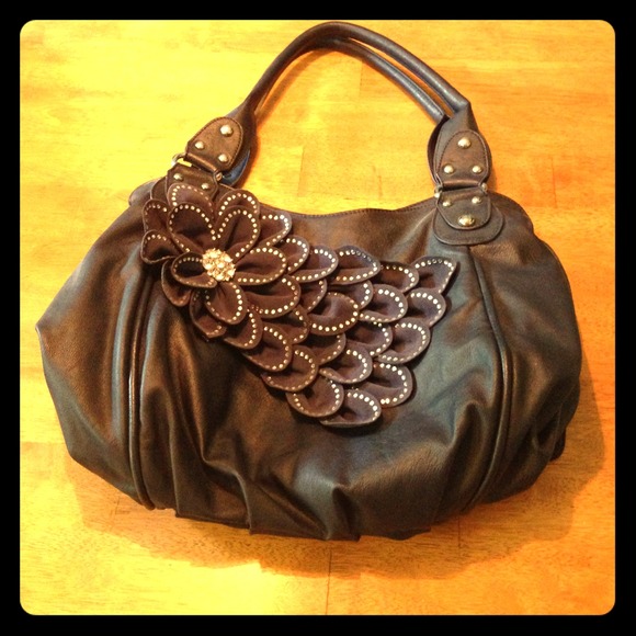 Navy shoulder bag with glam flower accent