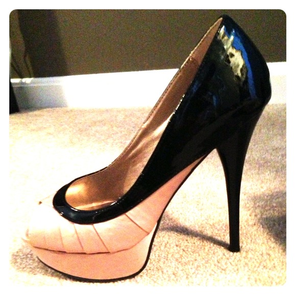 Pink and black peek a boo toe platform pump