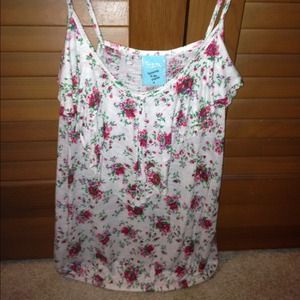 Fun and flirty floral tank!
