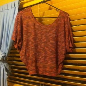 A gray and pink shirt that's short