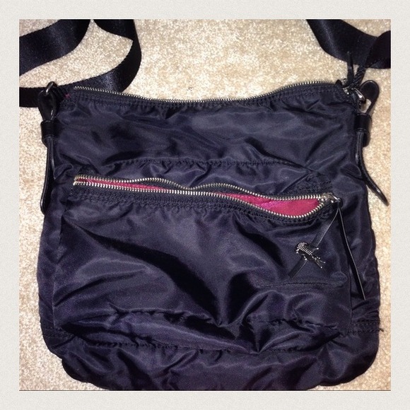 Lacoste Medium sized swing back