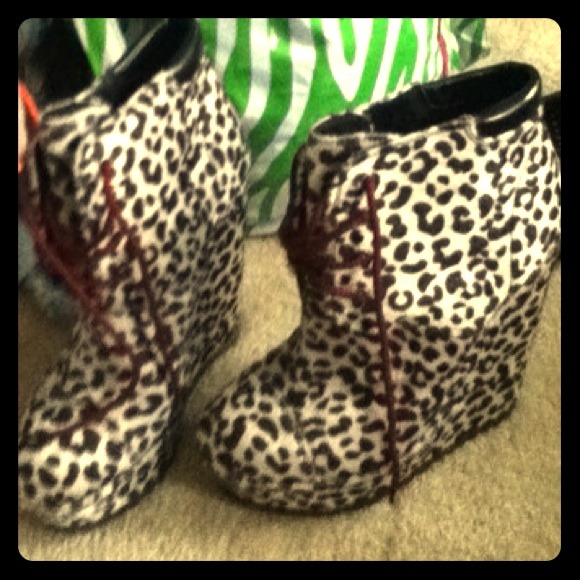 These are a pair of 10'' soft leopard wedge heels.