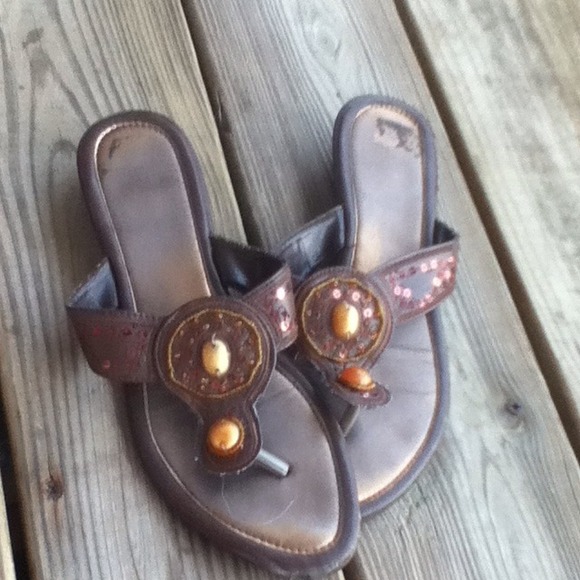 Used heel sandals