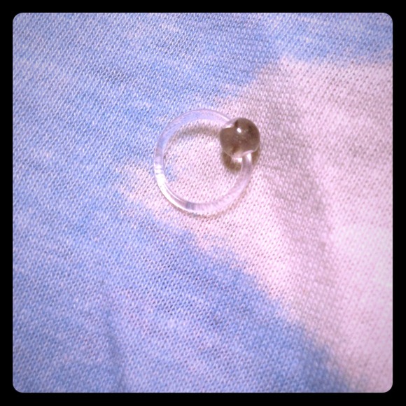 Clear captive ring