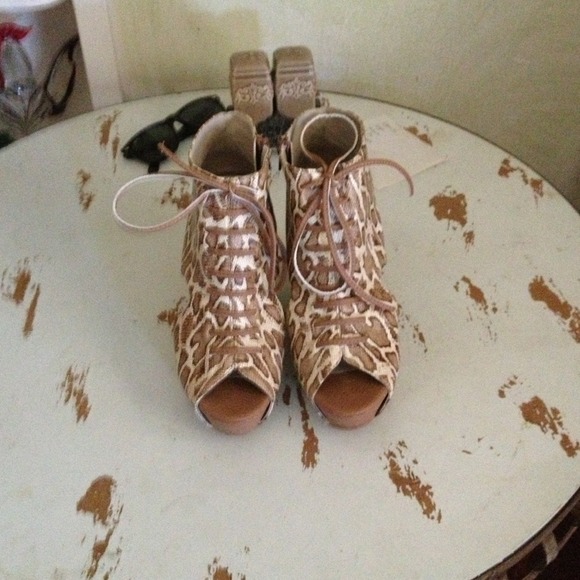 Brown snake skin wedges with cut out on the sides