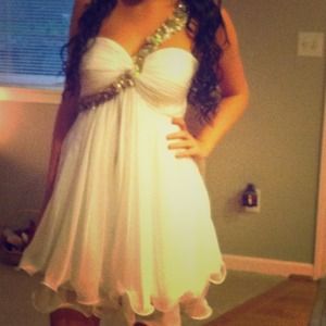 A short one gold strap homecoming dress