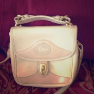 Dooney & Bourke handbag in All weather leather.