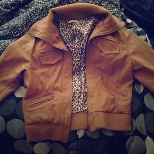 Leather jacket with cheetah print lining!