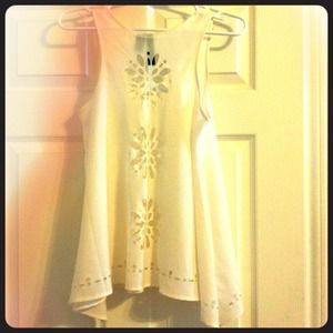 Fun, flowy white tank with laser-cut detailing!