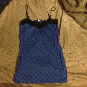 Blue polka dotted tank.
