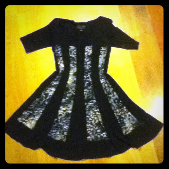 Slimming black dress, with cute pattern. - Picture 1 of 3