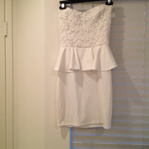 White strapless peplum and lace mini dress