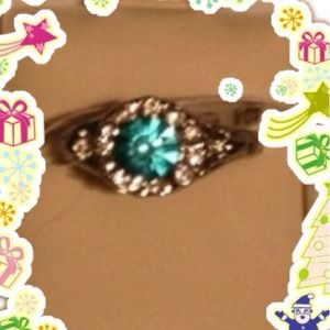 Silver ring with blue stone