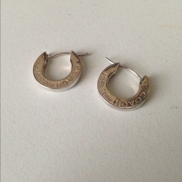 Silver coach earrings. Authentic