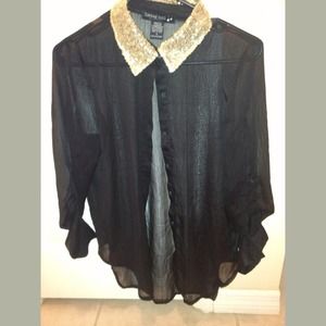 😃Sheer black shirt with gold collar.