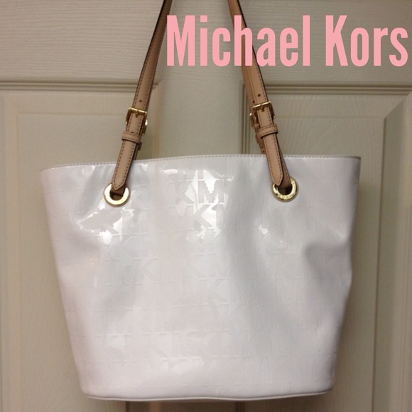 Buy NOW!!! Clear Closet Week! MK White Tote!