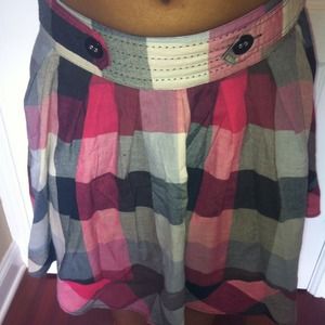 Plaid maxi skirt with buttons and zipper.