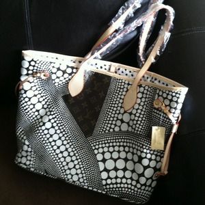 Never fold mm  handbag