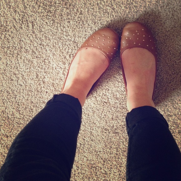 Tan and gold flats