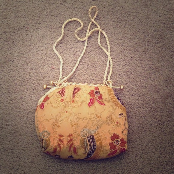 Small gold hand clutch