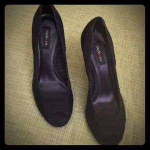 Size 7.5 black peep toe heels. Leather outsole.