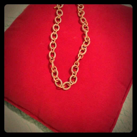 Goldstone and silver chain link necklace.