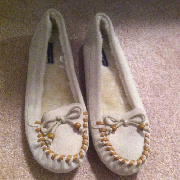 Leather shoes with faux fur lining.