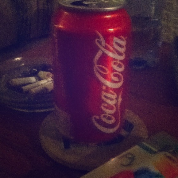 An empty coca cola can for 50 cents